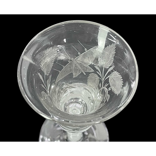 190 - A George III wine glass. The bell bowl engraved with a butterfly, flowers and foliage, on an opaque ... 