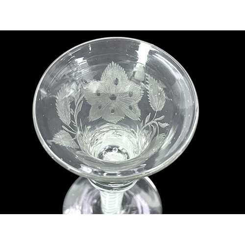 190 - A George III wine glass. The bell bowl engraved with a butterfly, flowers and foliage, on an opaque ... 