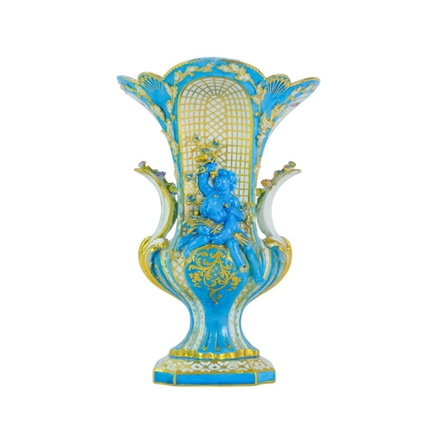 192 - A Sevres ornate bleu celeste vase. 18th century, moulded in relief with four cherubs emblematic of t... 