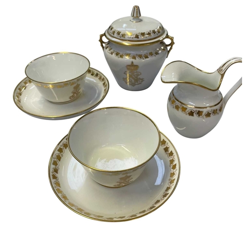 198 - A Sevres Dore Napoleon III tete a tete set. 19th century, comprising a tray, teapot and cover, sucri... 