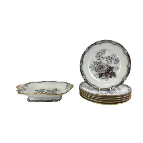 203 - A Victorian mulberry ware dessert service. Flora pattern by Samuel Alcock, comprising twelve dessert... 