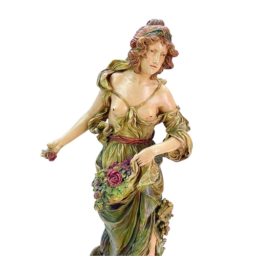 209 - An Ernst Wahliss Austrian Art Nouveau painted terracotta figure. Of a maiden, in flowing robes with ... 