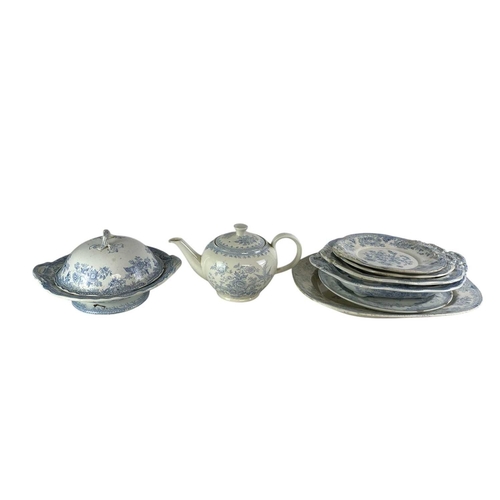 216 - A collection of Asiatic Pheasant dinner ware. Including platters, a teapot, vegetable dishes and cov... 