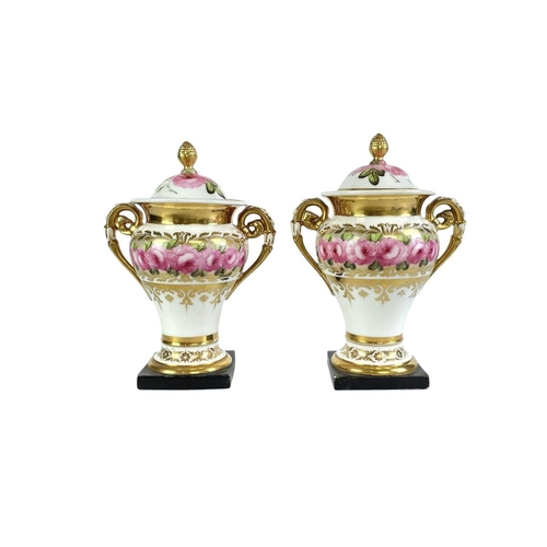 219 - 19th century and later ceramics. Including two twin-handled covered vases decorated with roses, two ... 