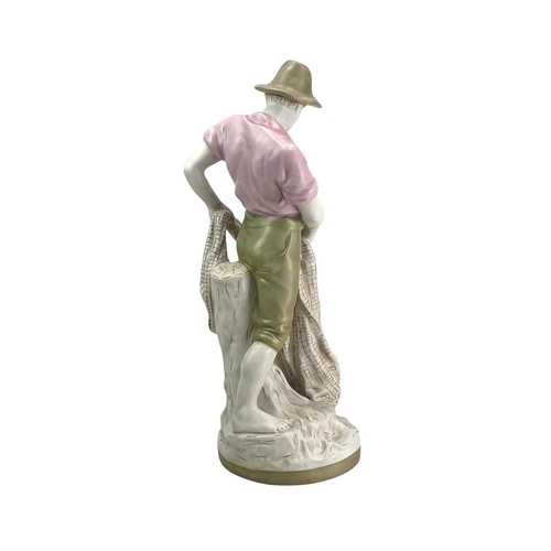 235 - A Royal Dux figure of a fisherman. Holding a net, with applied and impressed marks, height 53cm.