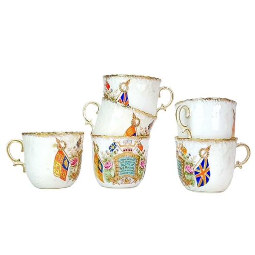 236 - A Staffordshire Victoria 1897 diamond jubilee tea set. By William Lowe, Longton, with printed and co... 