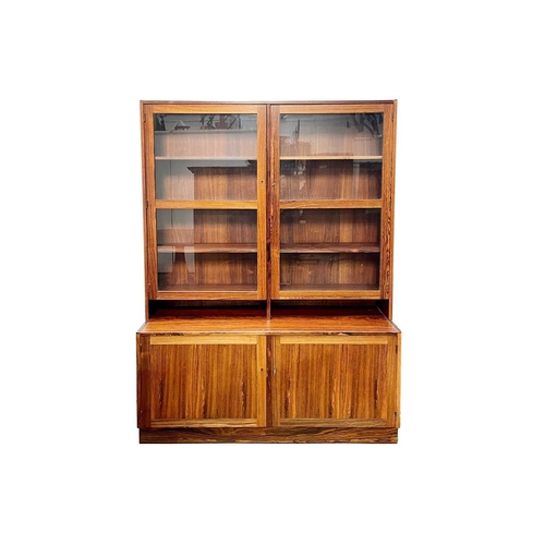 247 - A pair of Danish side cabinets/units. Mid-Century, in Indian rosewood possibly by Paul Hundevad, wit... 