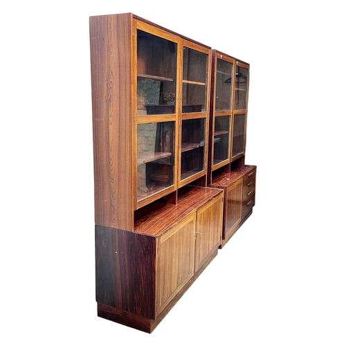 247 - A pair of Danish side cabinets/units. Mid-Century, in Indian rosewood possibly by Paul Hundevad, wit... 