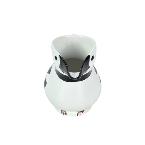 250 - A Norwegian Egersund puffin or razorbill jug. Mid-century, with black markings, the beak forms the s... 