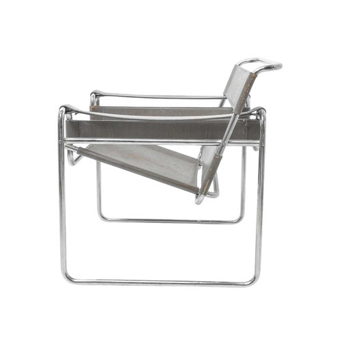 255 - A Wassily type chrome and grey leather armchair After the design by Marcel Breuer, height 73cm, widt... 