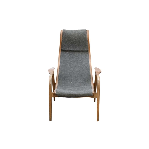 262 - A mid century Swedese Lamino easy chair. Designed by Yngve Ekstrom, in grey woven upholstery fabric,... 