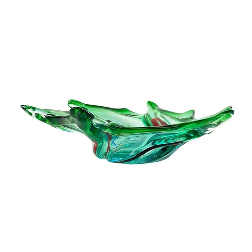 264 - Eight colourful art glass dishes of organic form. Mid 20th century, Italian and Czechoslovakian, the... 