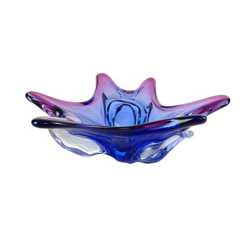 264 - Eight colourful art glass dishes of organic form. Mid 20th century, Italian and Czechoslovakian, the... 