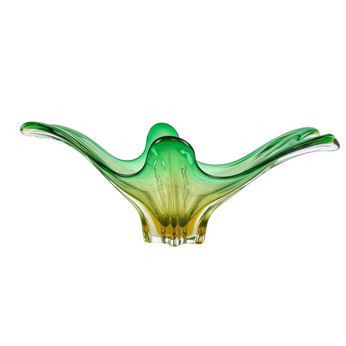 264 - Eight colourful art glass dishes of organic form. Mid 20th century, Italian and Czechoslovakian, the... 