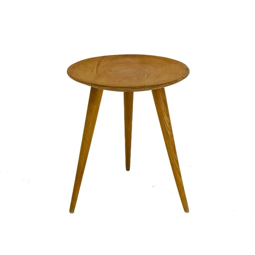 266 - A mid century circular beech coffee or occasional table. With a slightly dished top, on three turned... 