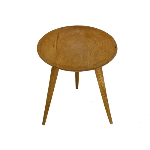 266 - A mid century circular beech coffee or occasional table. With a slightly dished top, on three turned... 