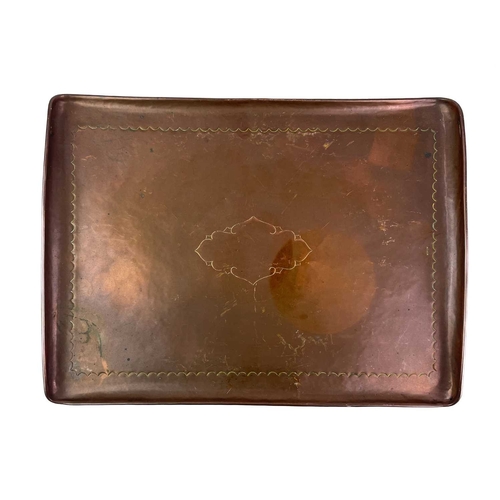 27 - Two Newlyn copper rectangular trays Each with a central cartouche, stamped Newlyn, the smaller of wh... 