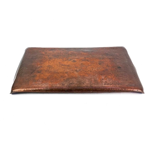 27 - Two Newlyn copper rectangular trays Each with a central cartouche, stamped Newlyn, the smaller of wh... 