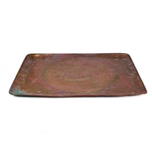 27 - Two Newlyn copper rectangular trays Each with a central cartouche, stamped Newlyn, the smaller of wh... 