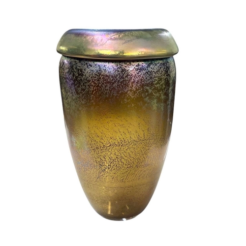 275 - Norman Stuart Clarke (1946). An iridescent art glass vase, with an everted rim, and speckled finish,... 