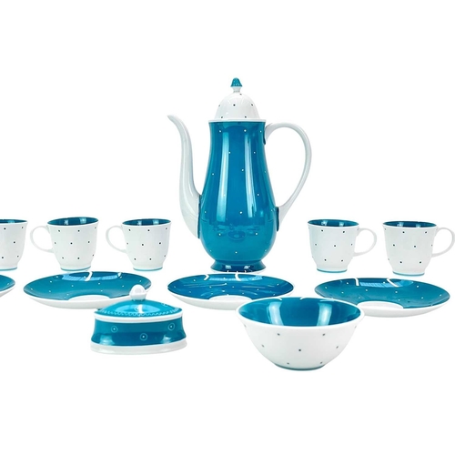 281 - A Susie Cooper mid century spotty coffee service. Including a coffee pot and cover, five cups and sa... 