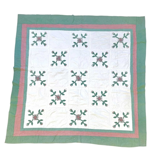 286 - A handsewn and embroidered single quilt with valance. White linen with hand embroidered flowers, wid... 