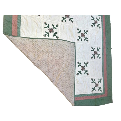 286 - A handsewn and embroidered single quilt with valance. White linen with hand embroidered flowers, wid... 