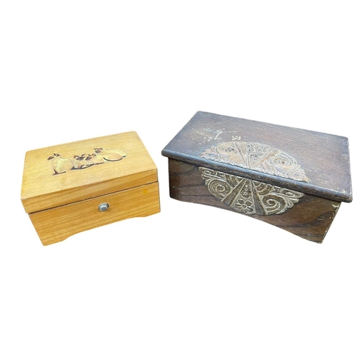 32 - Two Thorens music boxes. One carved oak and the other decorated with Siamese cats, both require atte... 