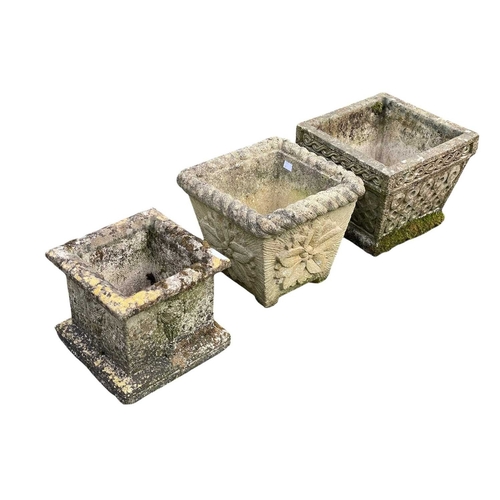 336 - Three assorted square reconstituted stone planters. Largest height 26cm, 31cm square.