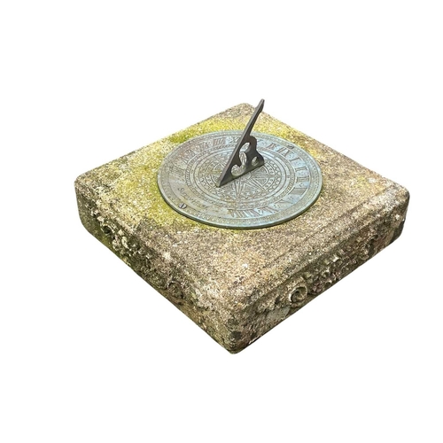 337 - A bronzed metal sundial on a reconstituted stone column. Height 91cm.