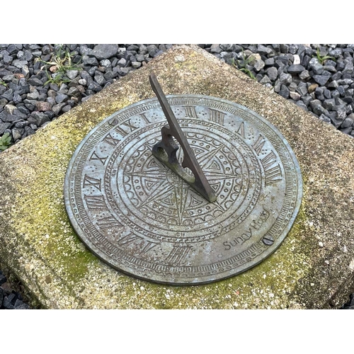 337 - A bronzed metal sundial on a reconstituted stone column. Height 91cm.