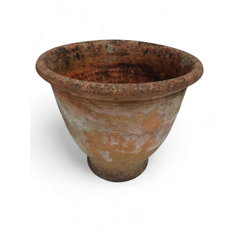 347 - A terracotta large garden planter. With incised floral bands, height 39cm, diameter 44cm.