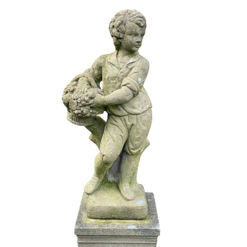 350 - A reconstituted stone statue of a boy with a basket of fruit. On a reconstituted stone stand with wr... 