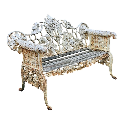 356 - A Coalbrookdale pattern cast iron garden bench. Oak and ivy pattern, height 93cm, width 146cm, depth... 