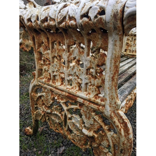 356 - A Coalbrookdale pattern cast iron garden bench. Oak and ivy pattern, height 93cm, width 146cm, depth... 