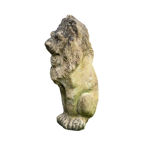 361 - A pair of reconstituted stone lions. Seated, height 48cm.