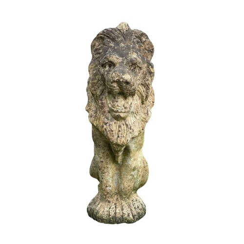 361 - A pair of reconstituted stone lions. Seated, height 48cm.