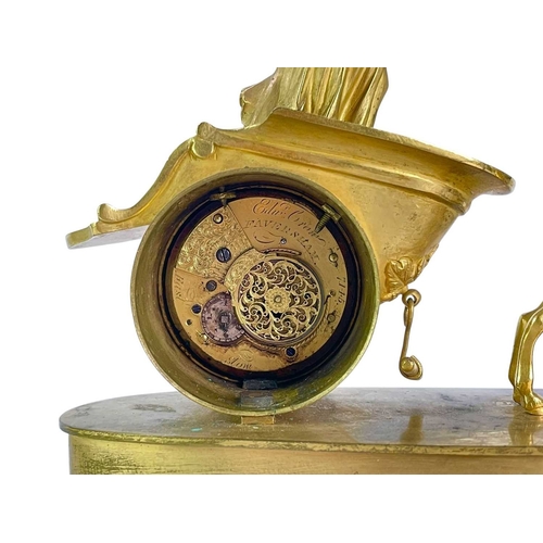 371 - A Regency gilt metal timepiece. Cast as Diana in her stag driven chariot, the watch type movement si... 