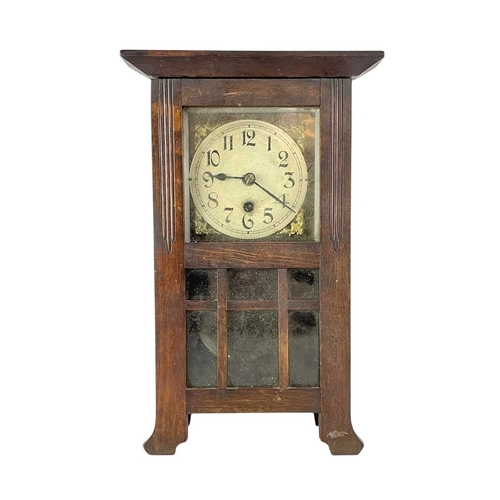 375 - A small continental mahogany drop dial wall clock. • labelled for Camerer Cuss & Co, height 30cm, to... 