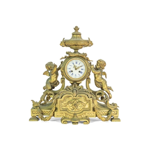 376 - A French ormolu clock garniture. Circa 1880, with a circular white enamel dial, the drum case flanke... 