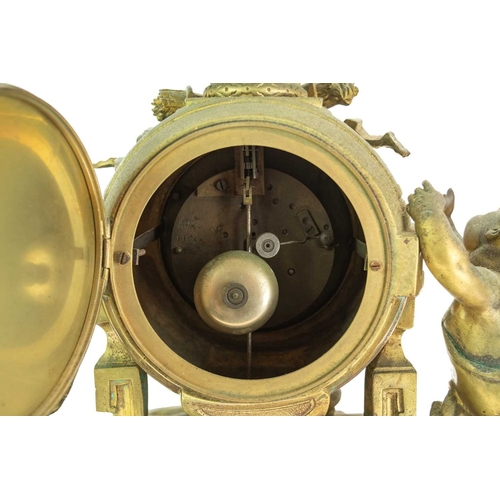 376 - A French ormolu clock garniture. Circa 1880, with a circular white enamel dial, the drum case flanke... 