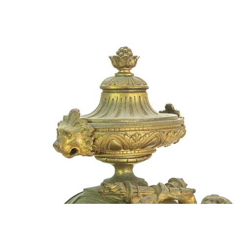 376 - A French ormolu clock garniture. Circa 1880, with a circular white enamel dial, the drum case flanke... 