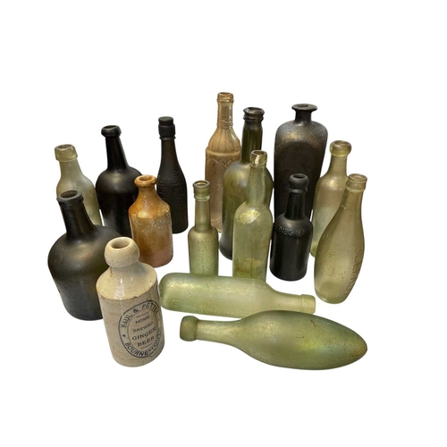 38 - 15 assorted glass bottles and two stoneware jars. Trawled, from around the UK, by a Newlyn based fis... 