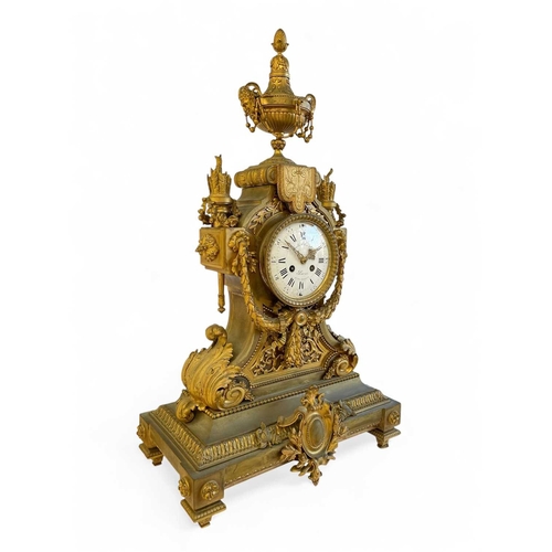 381 - An ornate French ormolu mantel clock. Circa 1870, the circular white dial signed 'Emile Colin & Cie,... 