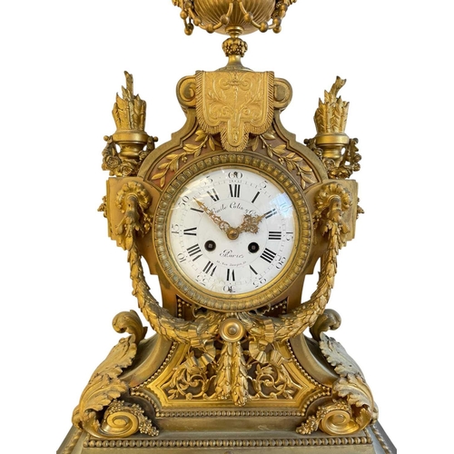 381 - An ornate French ormolu mantel clock. Circa 1870, the circular white dial signed 'Emile Colin & Cie,... 