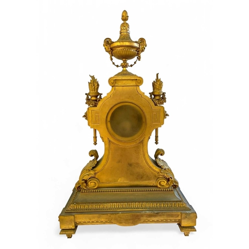 381 - An ornate French ormolu mantel clock. Circa 1870, the circular white dial signed 'Emile Colin & Cie,... 