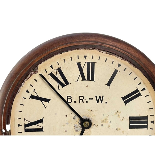 384 - A GWR single fusee mahogany circular station wall clock. The dial re-painted B.R-W, with applied lab... 