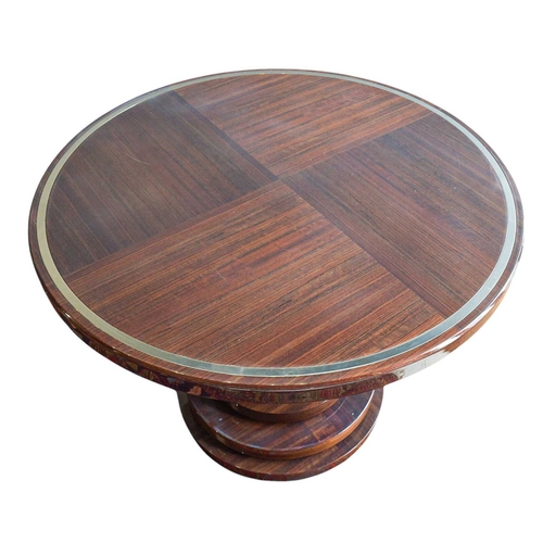 399 - ± Superyacht furnishings, a contemporary circular dining table. Highly lacquered dark wood veneer, f... 