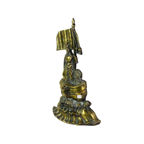 4 - A heavy Victorian brass door stop of Brittania. The figure cast in a typical pose upon the bow of a ... 