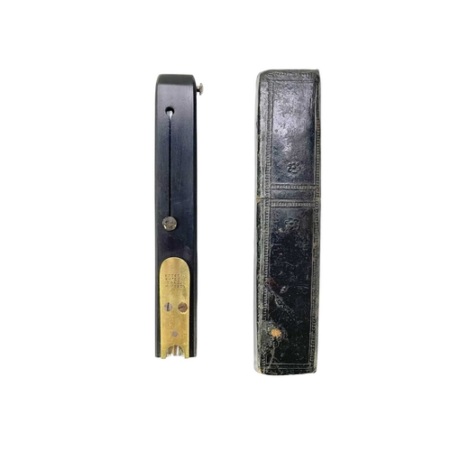 40 - A Victorian brass and ebony quill cutter. Stamped 'Rogers cutler to her Majesty', with a retracting ... 